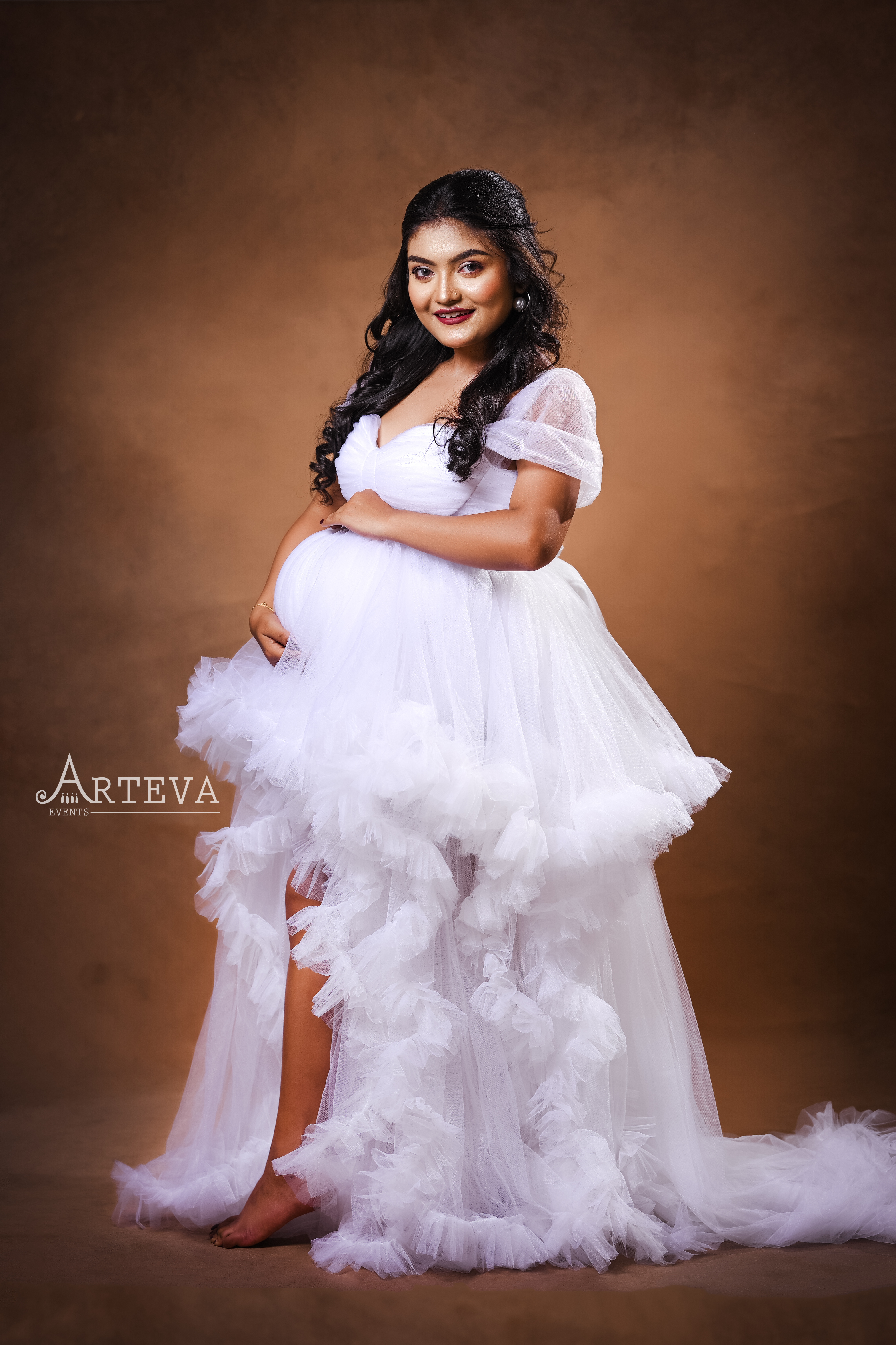 c-Maternity Photoshoot in White Gown
